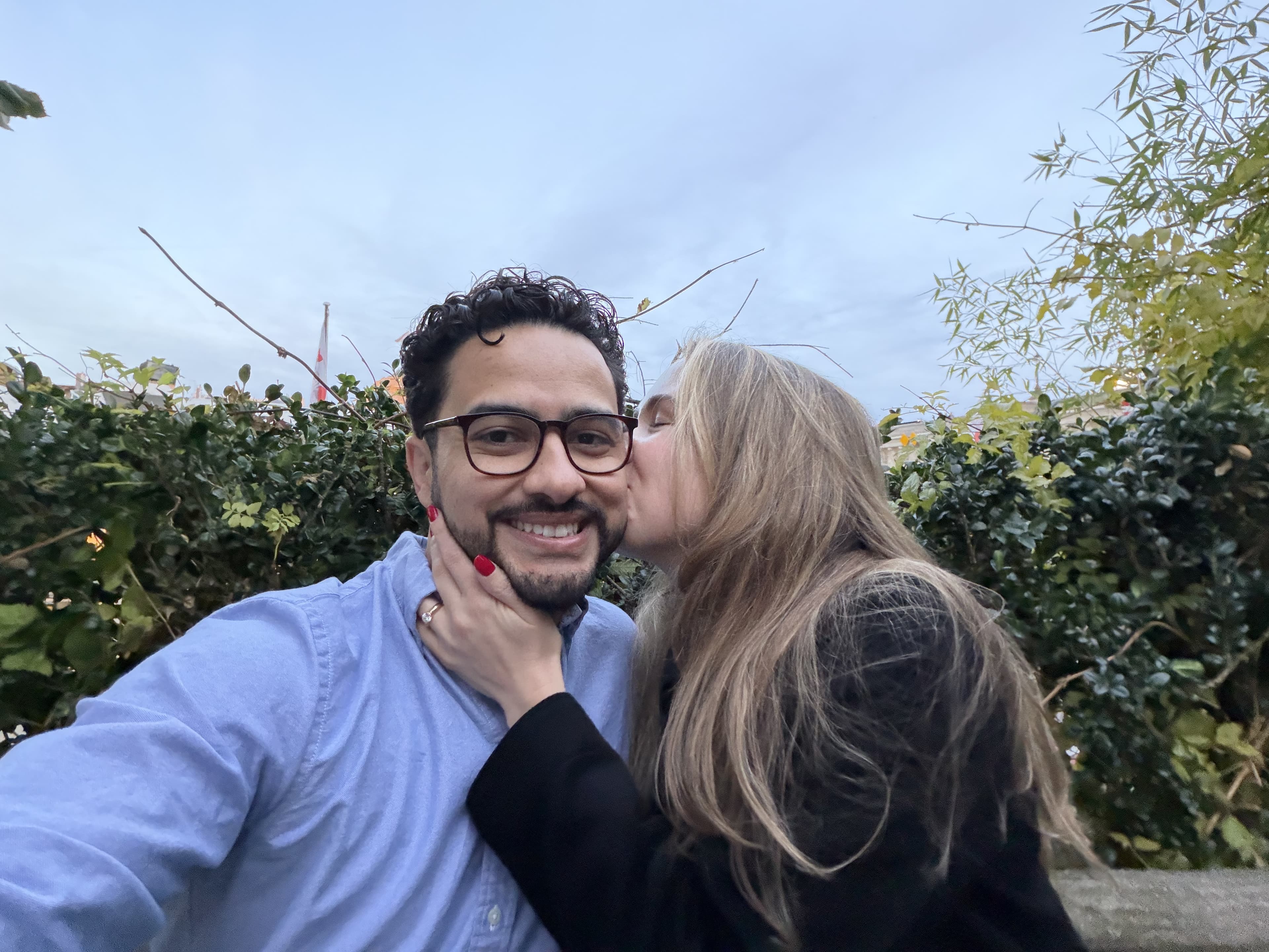 Miriam and Thiago showing the engagement ring